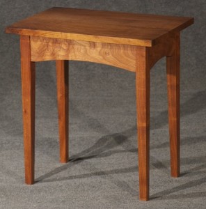 Occasional table with arches